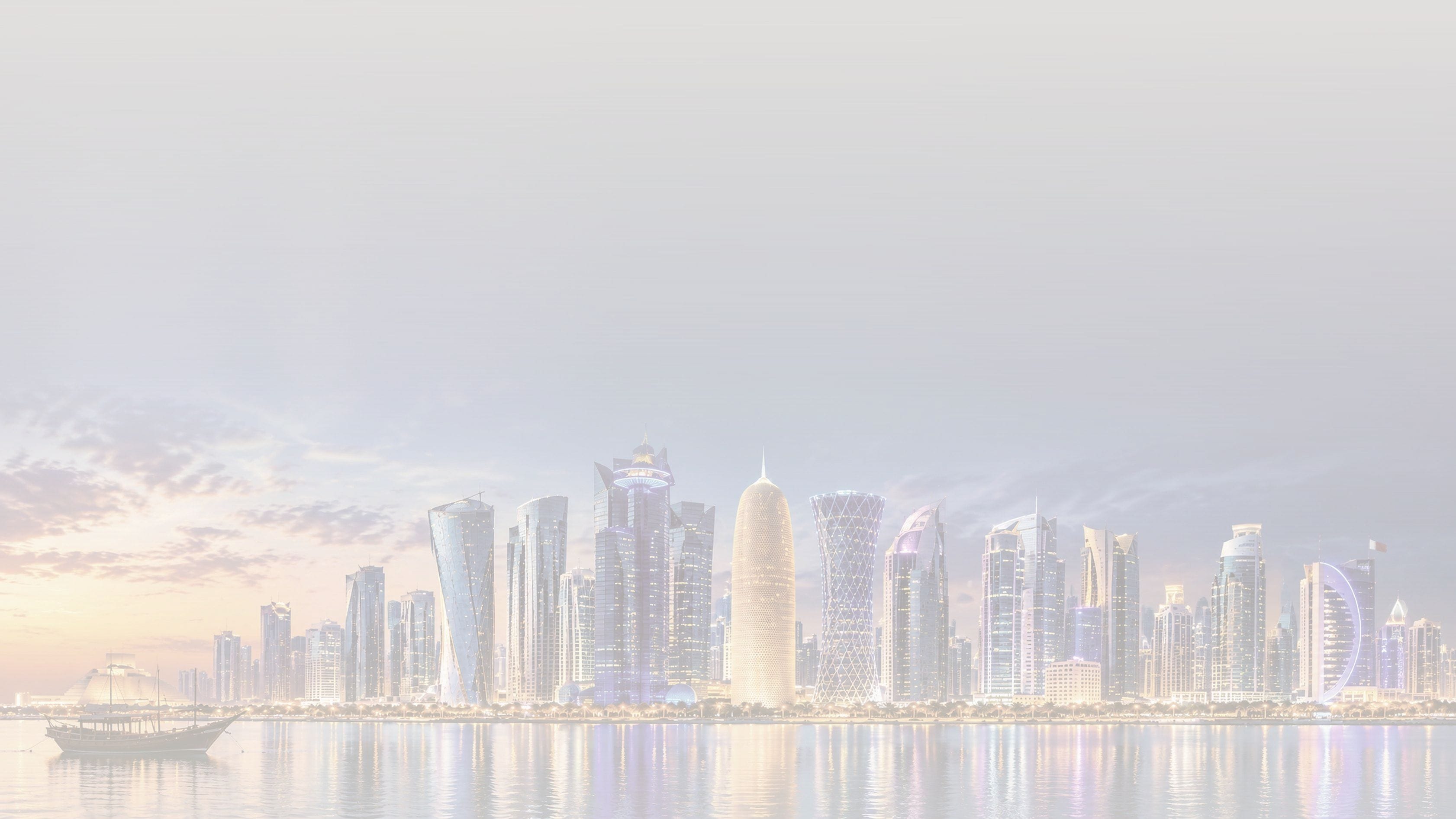 Doha skyline at twilight across the bay, with a traditional dhow on the water